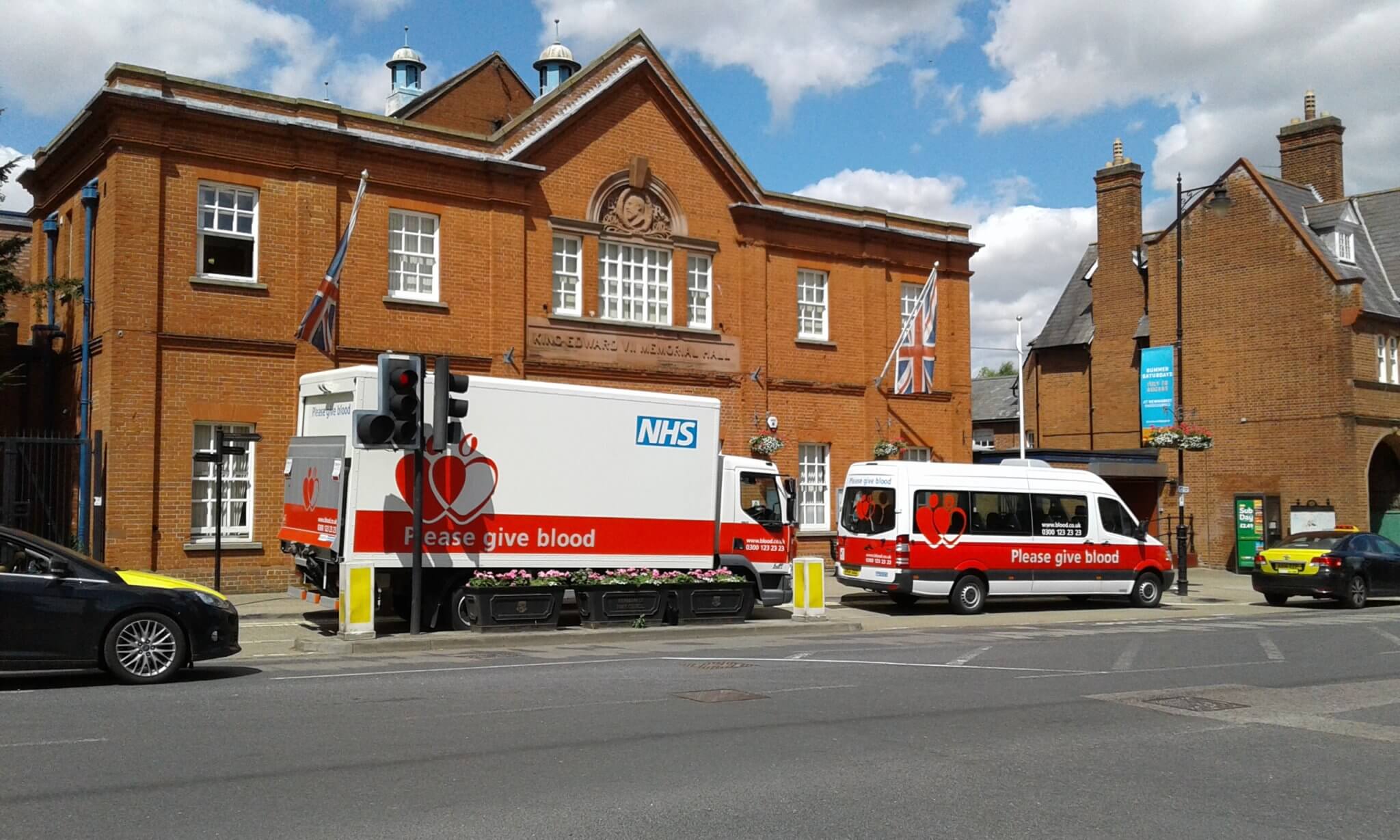 Give blood vans outside of Newmaket Town Hall